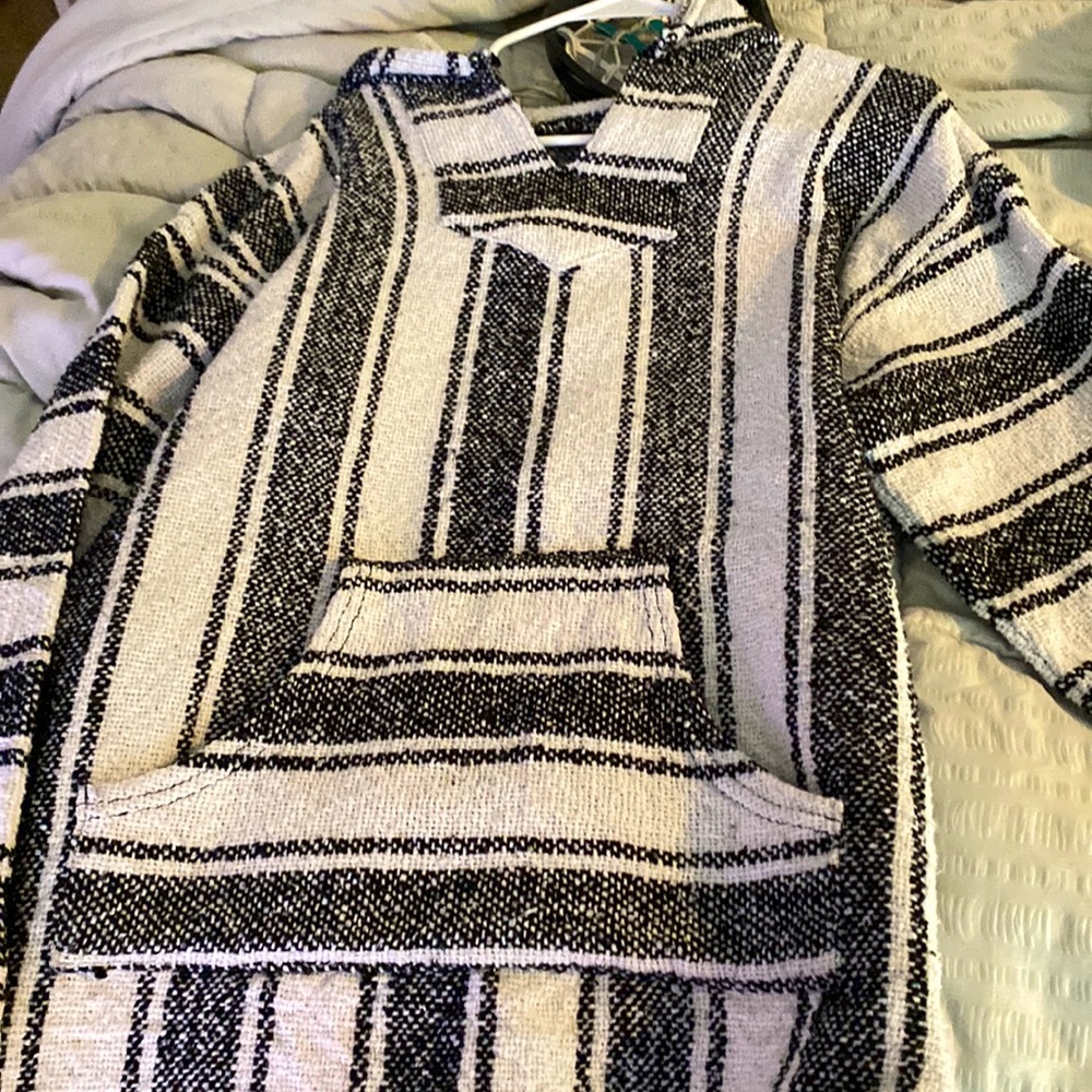 White and black sweater